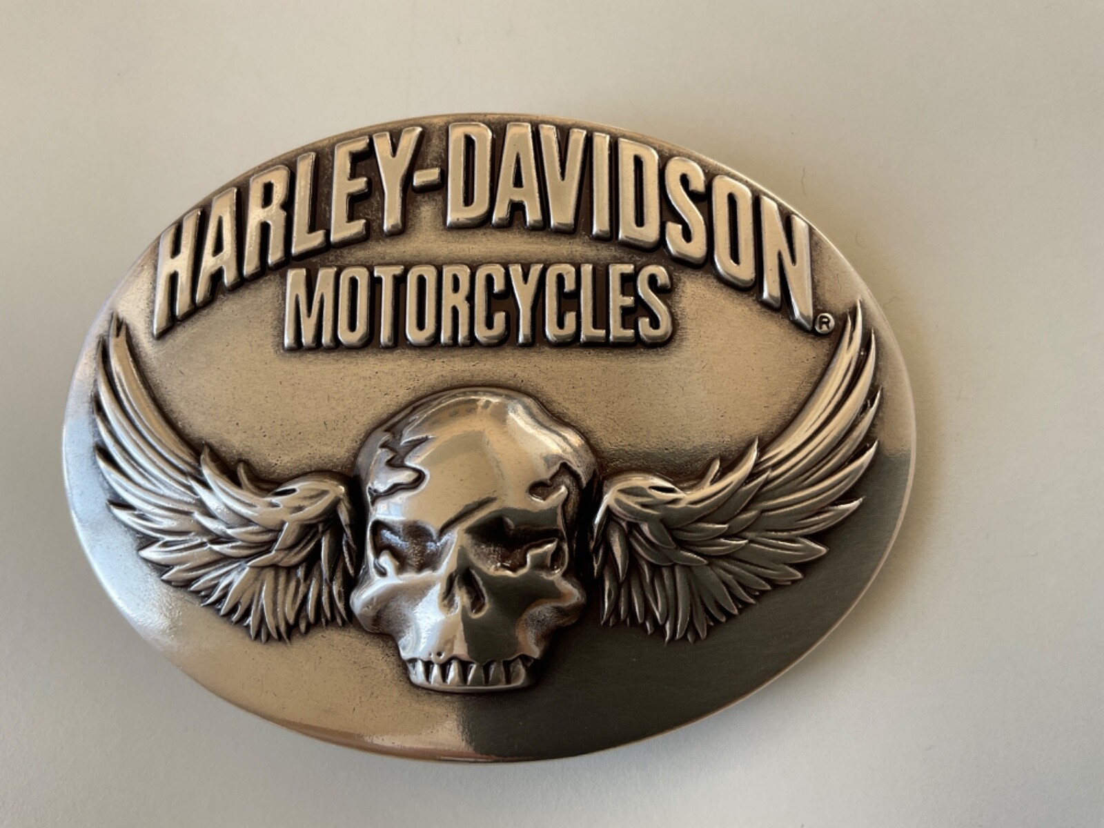 Harley-Davidson men&rsquo;s Skull with Wings belt buckle.#97744-08VM.Silver plated.