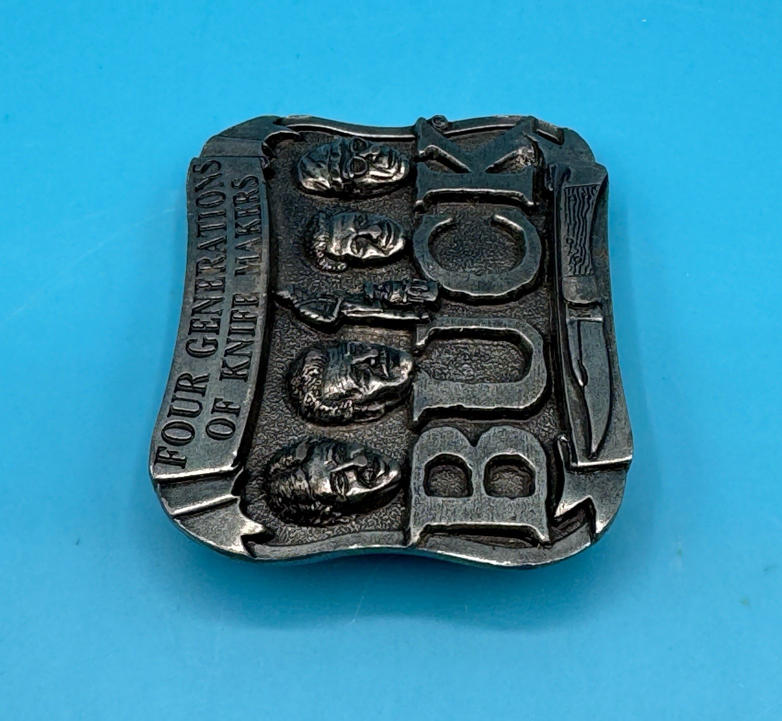 VINTAGE **FOUR GENERATIONS OF KNIFE MAKERS – BUCK KNIVES** BELT BUCKLE