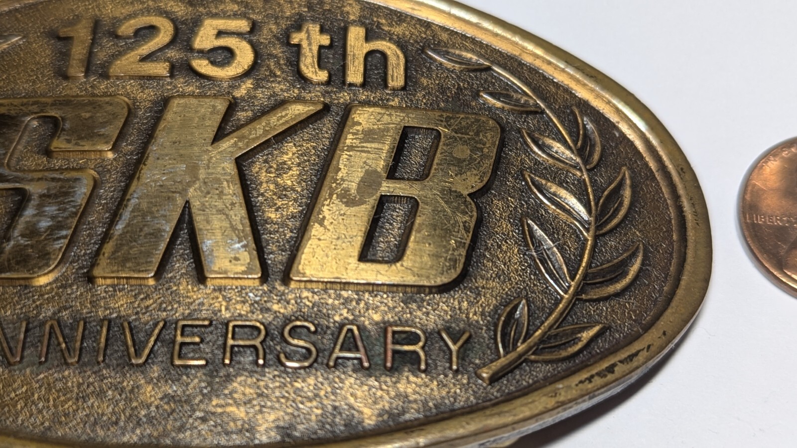 VINTAGE 125TH ANNIVERSARY SKB BELT BUCKLE