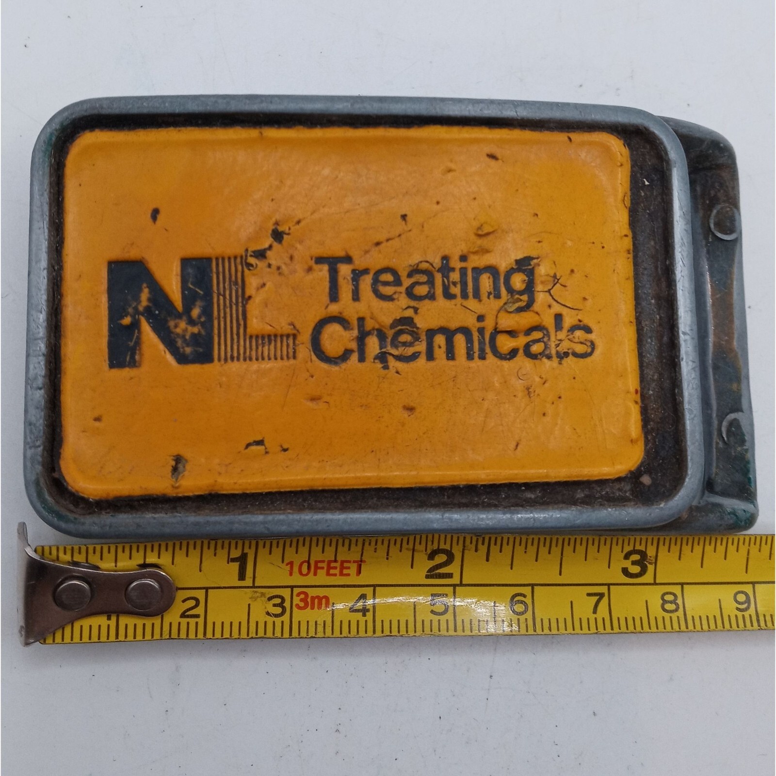NL Treating Chemicals Belt Buckle Yellow Vintage Distressed Well Worn