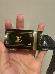 rare Louis Vuitton Belt Buckle Cellphone.