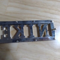 Nike Spell Out Logo Belt Buckle