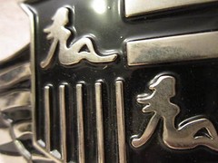 NEW POLISH BLACK TRUCKER GIRL CREST BELT BUCKLE BOTTLE OPENER 5.25 X 2 VIC-THOR1