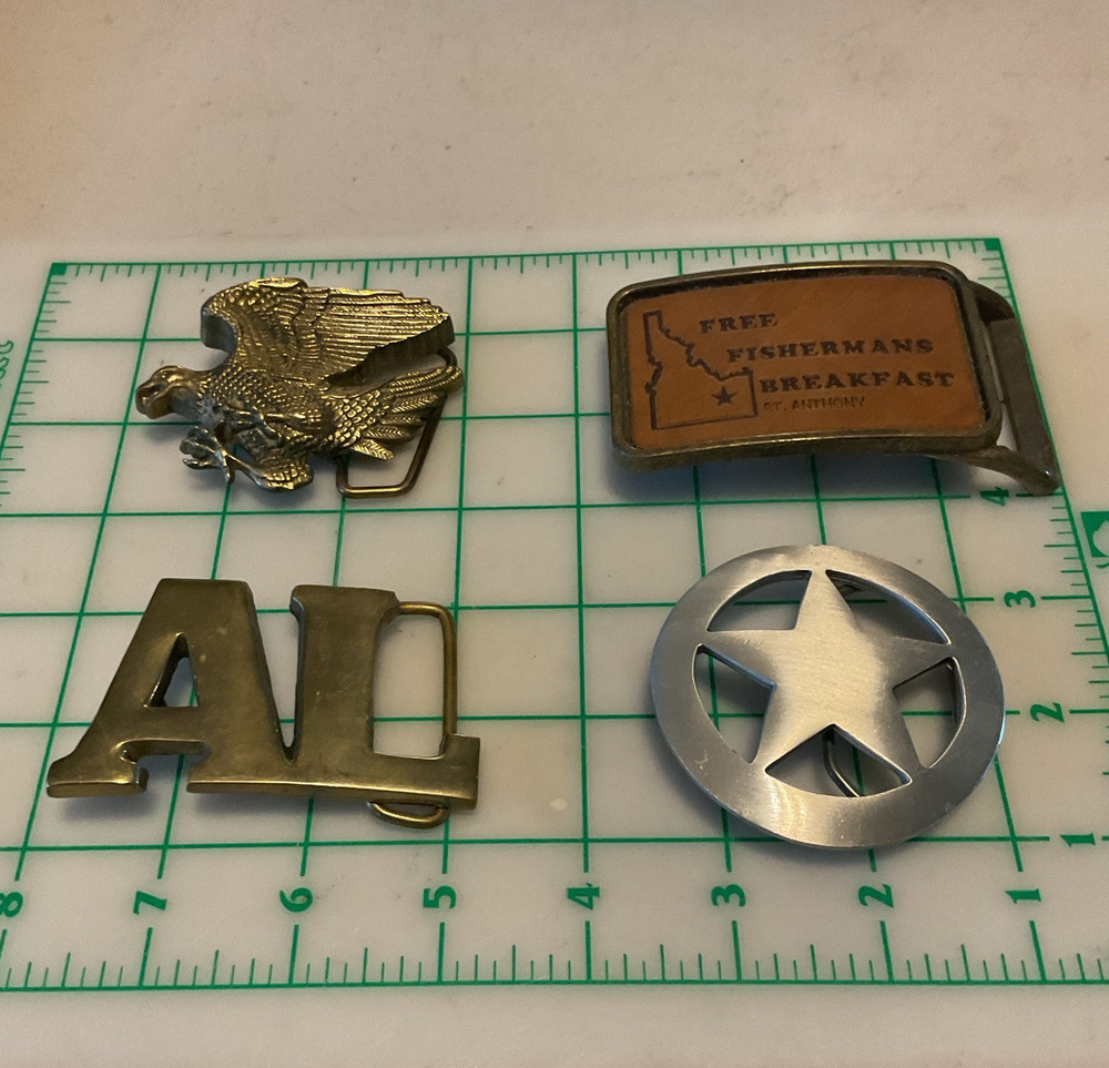 Lot of 4belt buckles brass pewter Star. Brass Eagle and others