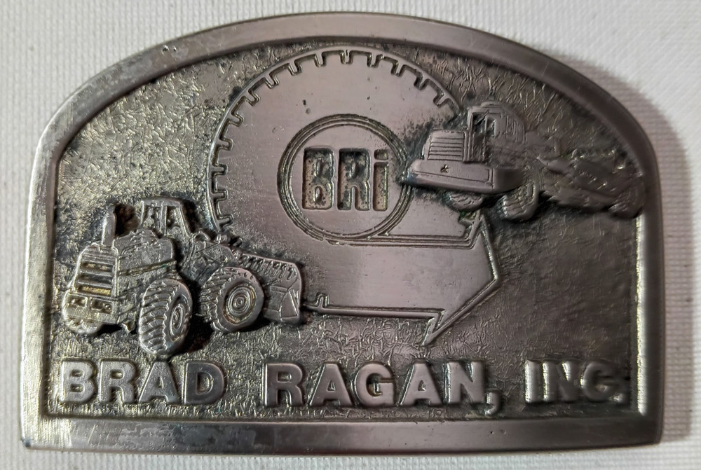 Vtg BRAD RAGAN Inc BRI Ag Construction On/Off Road Tire Dealer Belt Buckle