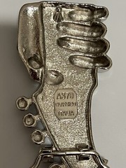 Hand Playing Guitar Belt Buckle Musician Guitarist with Skulls and Bling