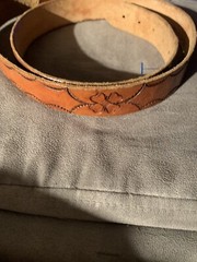 Shambu Belt And Buckle. Flower design, light brown and very unique