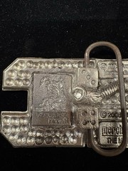 2006 vintage silver toned 2pac belt buckle featuring yellow rhinestones RARE