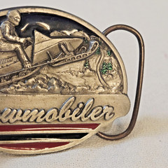 Belt Buckle – C+J Inc. 1990 Snowmobiler (with wear)