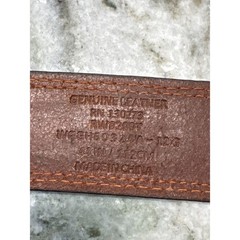 Men&rsquo;s brown leather belt featuring a prominent woven-inlay pattern size 44