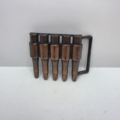 Vintage 1980&rsquo;s Metal bullet belt buckle copper tone gun ammunition. Hong Kong