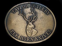 TG13123 VINTAGE 1970s **TAYLOR CUTLERY ELK HORN KNIVES** BELT BUCKLE