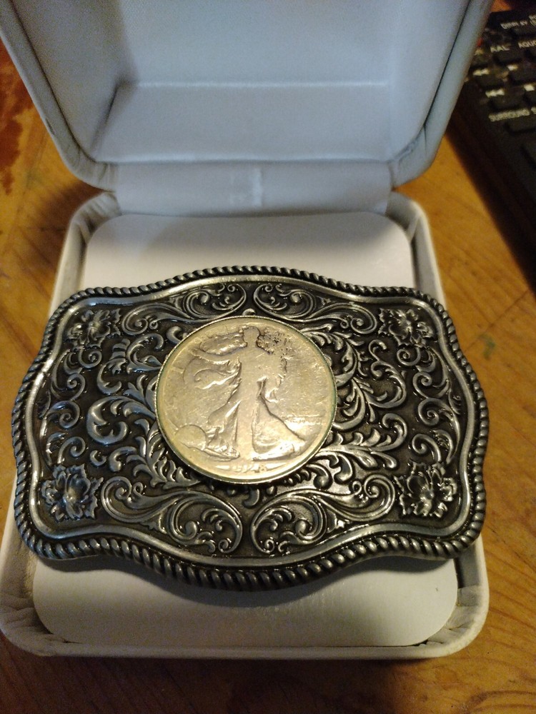 Western style belt buckle.steel with a walking liberty silver coin. 