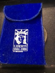 Belt Buckle Mens Keep The Torch Lit 1886 To 1986. Comes With Pouch
