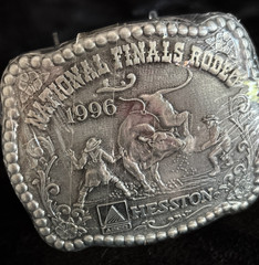 Hesston NFR 1996 Commemorative Belt Buckle New in Shrinkwrap Award Design Medals