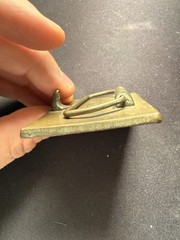 BERGAMOT BRASS WORKS CHILD HOLDING FLOWERS METAL BELT BUCKLE