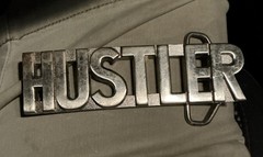 HUSTLER Block Letter Word Statement Cutout Silver Color Belt Buckle