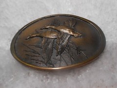 Wild Wings Inc. Lake City, Minnesota 55041 Brass Ducks Belt Buckle