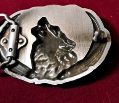 Belt Buckle Wolf Howling At The Moon With Black And White Enamel Detail Feathers