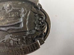Kessler Belt Buckle The Spirit of Wisconsin 1993 Smooth as Silk bronze wearing