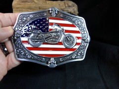 Motorcycle Belt Buckle with the American Flag & 4 Skulls in the middle & ends.
