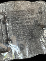 Hesston NFR 1996 Commemorative Belt Buckle New in Shrinkwrap Award Design Medals