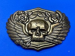 Dimensional Skull Head With Wings And Flowers – Raised Metal Belt Buckle