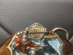 The Great American Belt Buckle Co 1982 Football Serialized solid Brass Enameled