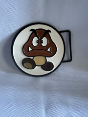 2011 SUPER MARIO BROTHERS GOOMBA BELT BUCKLE NINTENDO LICENSED NEW!