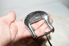 Pre-owned Belt Buckle, Silver in color. 2.5&Prime; x 2.5&Prime; Dated R 1999