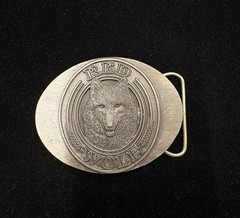 Vintage oval belt buckle featuring a detailed relief of red wolf head RARE
