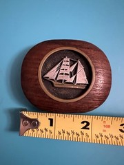 Belt buckle carved wood and pewter inlay of a sailboat