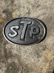 Vintage STP Corporation Belt Buckle from Level Cross NC