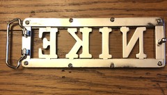Nike Spellout Belt Buckle Silver