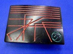 Unknown to me! Geometric Abstract Lines Red Over a Black Enamel Belt Buckle