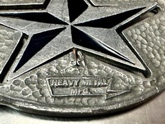 Moving Reversible Star (Red or Black) Belt Buckle by Heavy Metal Manufacturing