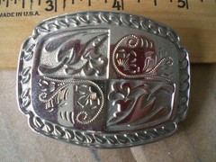 2 silver tone shiny belt buckles