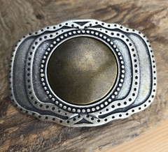 Unique vintage brass and steel belt buckle.