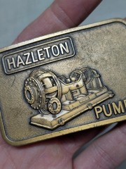 vintage HAZELTON PUMPS belt buckle SOLID BRASS western MINING oil industrial