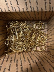 Lot 100 Belt Buckles. Approx. 2 inch X 1 Inch. Steel Buckle with Brass Finish