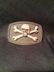 SKULL & CROSSBONES JOLLY ROGER BELT BUCKLE W/ RAISED SKULL & BONES 41/2 BY 3 IN