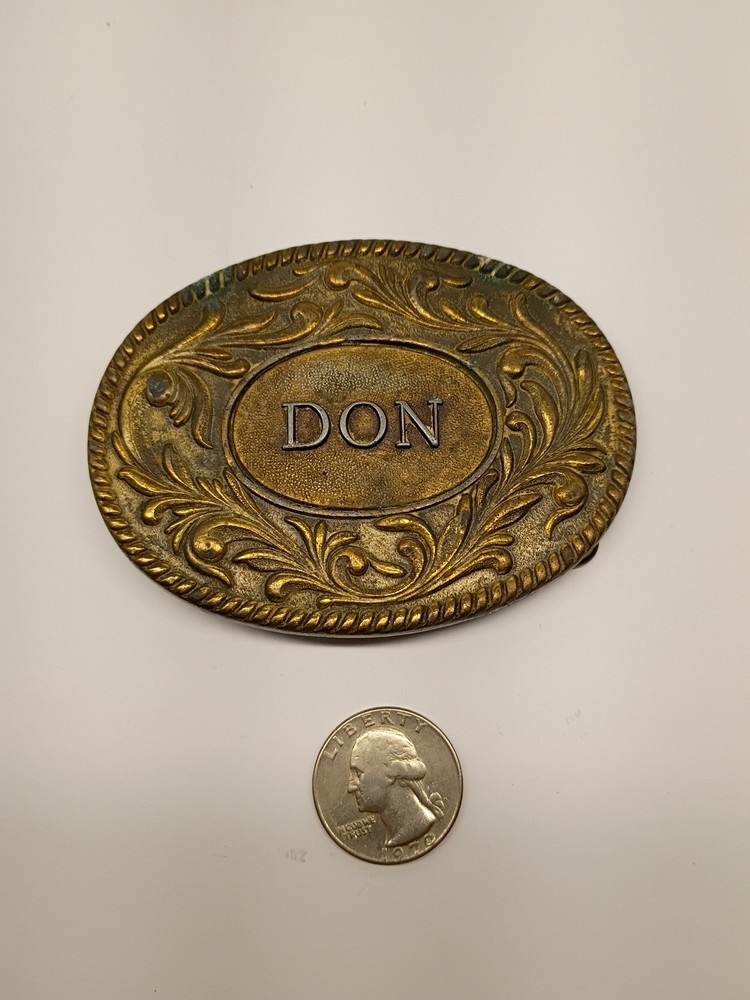 Vintage 1977 The Kinney Co « Don » Oval Metal Belt Buckle