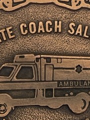 AMBULANCE BELT BUCKLE / TRI-STATE COACH SALES, INC. Mc HENRY, ILLINOIS