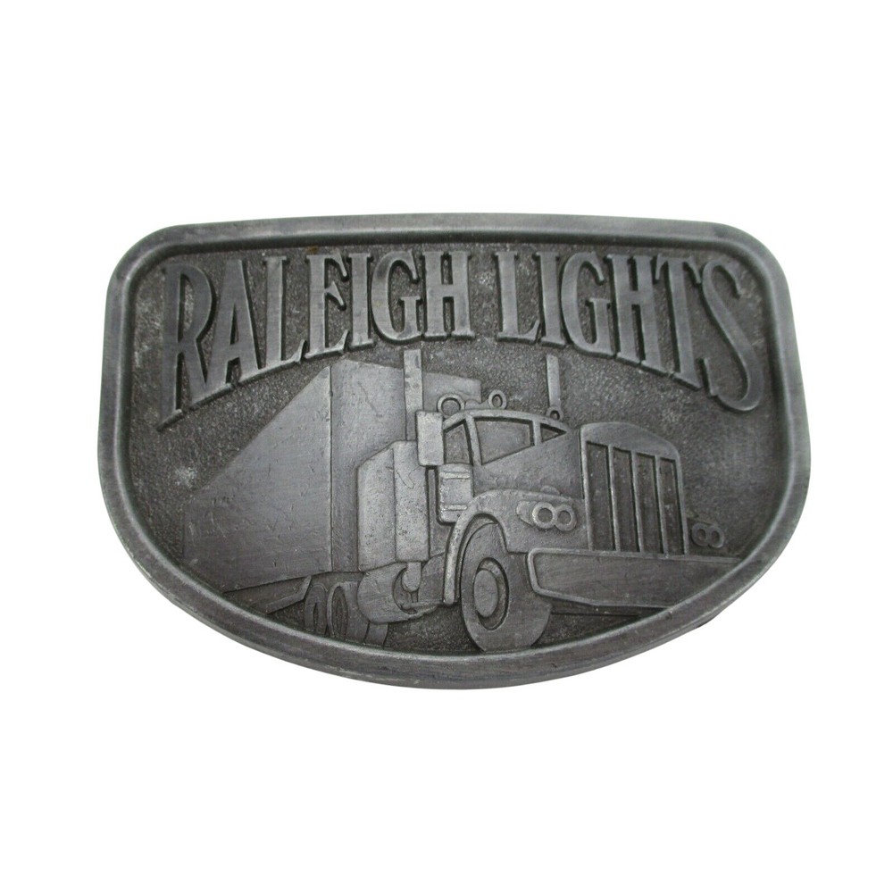 Raleigh Lights Belt Buckle Vintage Semi Truck Promotional Item