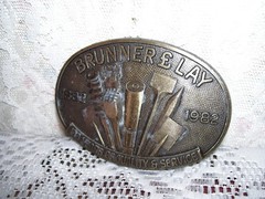 Carpenter Belt Buckle Brunner & Lay 1882 – 1982