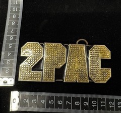 2006 vintage silver toned 2pac belt buckle featuring yellow rhinestones RARE