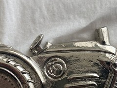 2004 Olander silver tractor belt buckle spinning back wheel