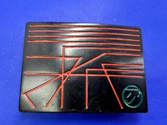 Unknown to me! Geometric Abstract Lines Red Over a Black Enamel Belt Buckle