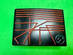Unknown to me! Geometric Abstract Lines Red Over a Black Enamel Belt Buckle