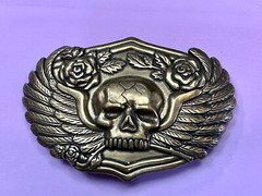 Dimensional Skull Head With Wings And Flowers – Raised Metal Belt Buckle